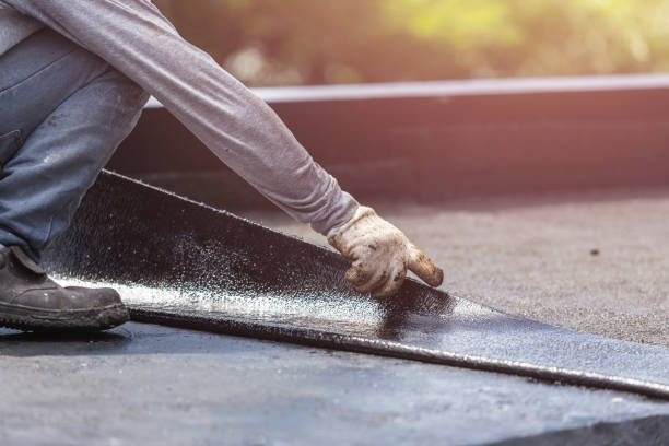 Professional Basement Waterproofing technician working in New Castle, AL